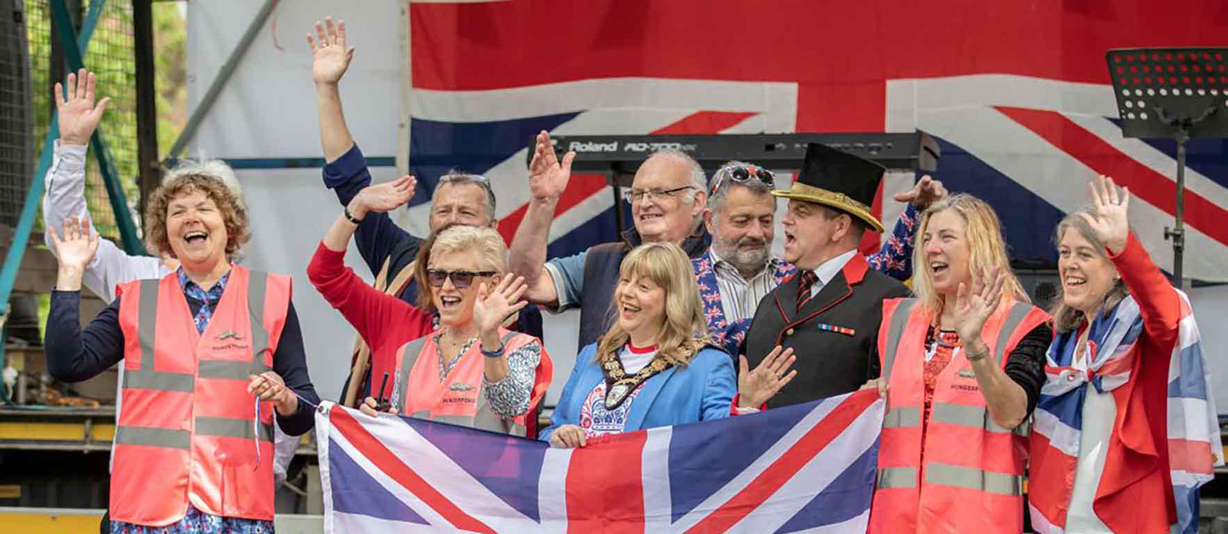 Smarten up Hungerford and Mayor holding flag